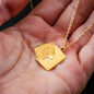 First [s] Engraved Envelope Necklace